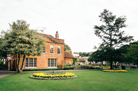 Winchester, UK - August 16, 2015: Park in the city a cloudy day. It is the ancient capital of England and former seat of King Alfred the Great.のeditorial素材