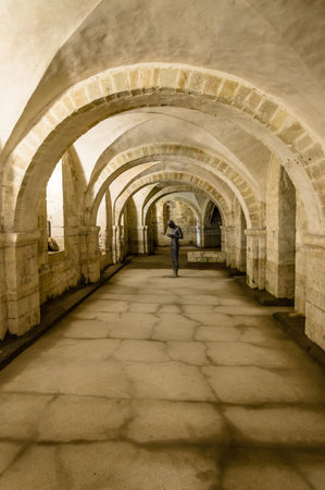 Winchester, UK - August 16, 2015: Interior view of the crypt of Winchester Cathedral. Dedicated to Holy Trinity is one of the largest cathedrals in Europe.のeditorial素材