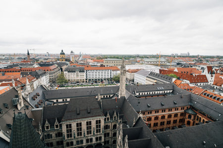 Munich, Germany - May 05, 2015: Aerial cityscape from the tower a cloudy day. City hall, Cathedral...