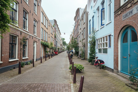 Amsterdam, Netherlands - August 2, 2016: Street in historical city center of Amsterdam. It is one of the most romantic and beautiful cities in Europe.  Amsterdam is also a city of tolerance and diversity.のeditorial素材