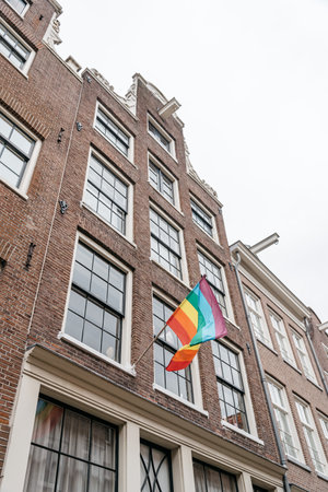Amsterdam, Netherlands - August 2, 2016: Street in historical city center of Amsterdam. It is one of the most romantic and beautiful cities in Europe.  Amsterdam is also a city of tolerance and diversity.のeditorial素材