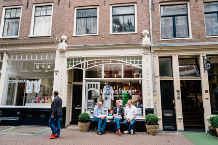 Amsterdam, Netherlands - August 2, 2016: Street in historical city center of Amsterdam. It is one of the most romantic and beautiful cities in Europe.  Amsterdam is also a city of tolerance and diversity.のeditorial素材