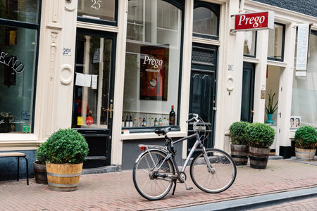 Amsterdam, Netherlands - August 2, 2016: Street in historical city center of Amsterdam. It is one of the most romantic and beautiful cities in Europe.  Amsterdam is also a city of tolerance and diversity.のeditorial素材