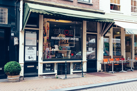 Amsterdam, Netherlands - August 2, 2016: Street in historical city center of Amsterdam. It is one of the most romantic and beautiful cities in Europe.  Amsterdam is also a city of tolerance and diversity.のeditorial素材