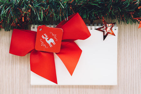 Christmas composition around a blank notebook with space for copy.の写真素材
