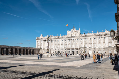 Madrid, Spain - November 13, 2016:   Royal Palace of Madrid, is the official residence of the Spanish Royal Family at the city of Madrid, but is only used for state ceremonies. Exterior view against blue sky day.のeditorial素材
