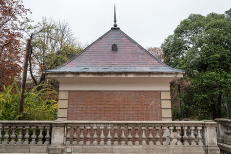 Madrid, Spain - November 20, 2016: Pavillion in Retiro Park a cloudy day. The Buen Retiro Park is a large and popular park at the edge of the city centre,のeditorial素材