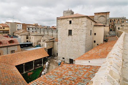 Avila, Spain - November 11, 2014:  The Medieval Walls of Avila and the cathedral. Cloudy day. The old city  and its extramural churchesのeditorial素材