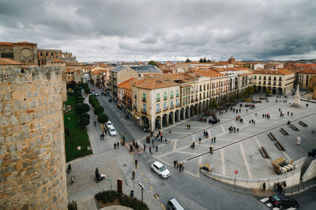 Avila, Spain - November 11, 2014:  Cityscape of Avila from Medieval Walls a cloudy day. The old city and its extramural churchesのeditorial素材