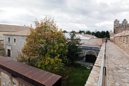 Avila, Spain - November 11, 2014:  The Medieval Walls of Avila. The old city of  and its extramural...