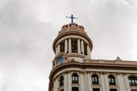 Madrid, Spain - September 18, 2016:   Low angle view of  buildings at Gran Via Street in Madrid. It is an important street in Central Madrid with shops and theaters.のeditorial素材