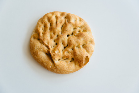 Loaf of bread on white table, food closeupの写真素材
