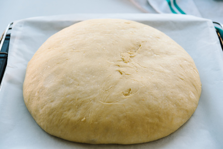 Close Up Of dough of bread On oven plate. Horizontal composition