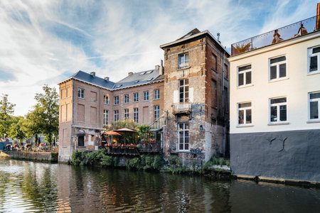 Mechelen, Belgium - July 29, 2016: Cityscape of Mechelen from the gangway on the canal. Mechelen is one of most prominent cities of historical art in  Flandersのeditorial素材