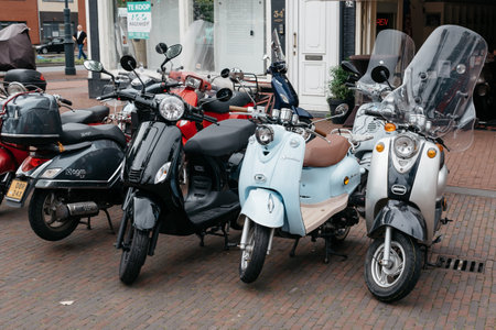 Haarlem, Netherlands - August 3, 2016: Old scooters parked in the streetのeditorial素材