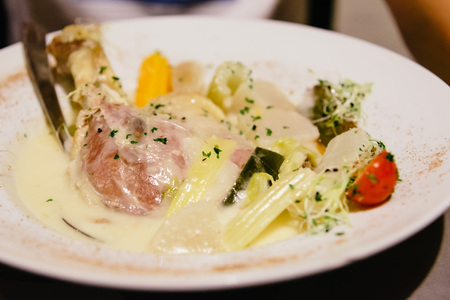 Typical belgian food with chicken and vegetablesの写真素材