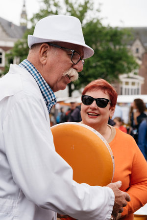Gouda, Netherlands - August 4, 2016: Gouda Cheese Market. It remains a spectacle at the heart of Hollandâs cheese industry, with its rituals and Dutch traditions now a must-see attraction.のeditorial素材
