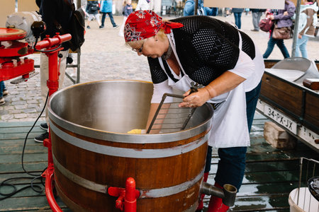 Gouda, Netherlands - August 4, 2016: Gouda Cheese Market. It remains a spectacle at the heart of HollandÃ¢ï¿½ï¿½s cheese industry, with its rituals and Dutch traditions now a must-see attraction.のeditorial素材