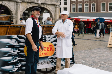 Gouda, Netherlands - August 4, 2016: Gouda Cheese Market. It remains a spectacle at the heart of HollandÃ¢ï¿½ï¿½s cheese industry, with its rituals and Dutch traditions now a must-see attraction.のeditorial素材