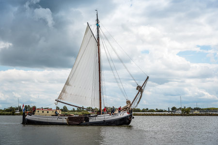 Enkhuizen, Netherlands - August 5, 2016: Old sailing ship in the harbour. At the peak of its power Enkhuizen was one of the most important harbour cities in the Netherlandsのeditorial素材