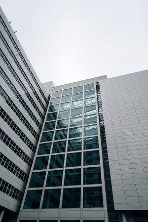 The Hague, The Netherlands - August 7, 2016: The Hague City Hall. It was designed by American architect Richard Meier. Low angle viewのeditorial素材