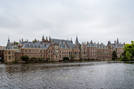 Hague, Netherlands - August 7, 2016:  Hofvijver, Court Pond, artificial lake beside the Binnenhof. Binnenhof  is a complex of buildings in the city centre of The Hague. Office of the Prime Minister and House of Representatives.のeditorial素材