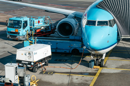 Amsterdam, Netherlands - August 10, 2016. Schiphol Airport.  Airplane refueling on airport runway. It is the main international airport of the Netherlandsのeditorial素材