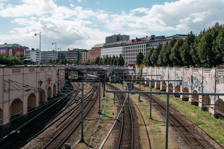 Copenhagen, Denmark - August 10, 2016. High angle view of train tracks nar station in Copenhagen city centre. The public transportation in Copenhagen is very reliable and punctual.のeditorial素材