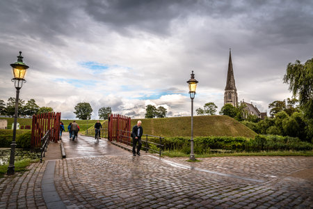 Copenhagen, Denmark - August 10, 2016. People is walking in Churchill Park in Copenhagen, Denmark, a rainy day of summerのeditorial素材
