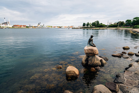 Copenhagen, Denmark - August 10, 2016. The Little Mermaid. The Little Mermaid is a bronze statue by Edvard Eriksen. The sculpture is displayed on a rock by the waterside in Copenhagenのeditorial素材