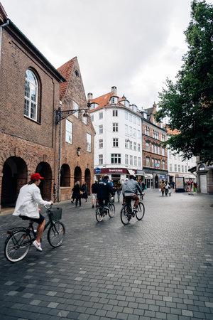 Copenhagen, Denmark - August 11, 2016. Cyclists in pedestrian street in central Copenhagen a cloudy day of summerのeditorial素材
