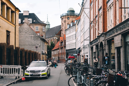 Copenhagen, Denmark - August 11, 2016. Police car in the streets of Central Copenhagen a cloudy day of summerのeditorial素材
