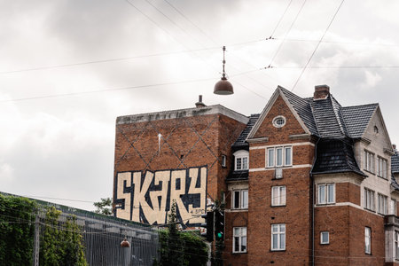 Copenhagen, Denmark - August 12, 2016. Low angle view of old residential buildings in historical city centre of Copenhagen a cloudy of summer near sunsetのeditorial素材