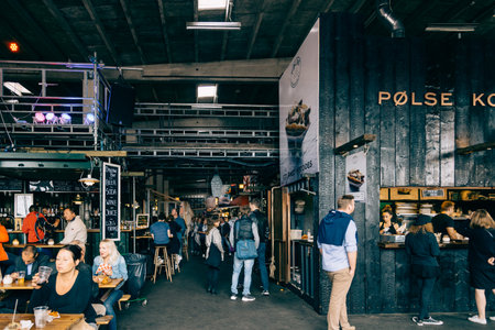 Copenhagen, Denmark - August 12, 2016: Indoor view of Papiroen Copenhagen Street food market with...