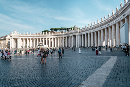 Rome, Italy - August 19, 2016: St Peters Square with a crowd of tourists a summer day. It is located directly in front of St. Peter's Basilica in the Vatican City and was designed by Berniniのeditorial素材