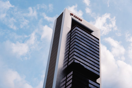 Madrid, Spain - June 25, 2017: Low angle view of  skyscraper in Cuatro Torres Business Area, CTBA, Four Towers Business Area, a business district in Madrid against skyのeditorial素材