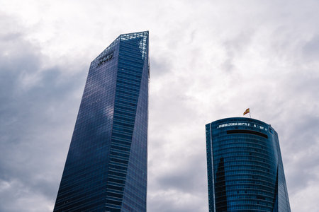 Madrid, Spain - June 25, 2017: Low angle view of  skyscraper in Cuatro Torres Business Area, CTBA, Four Towers Business Area, a business district in Madrid against skyのeditorial素材