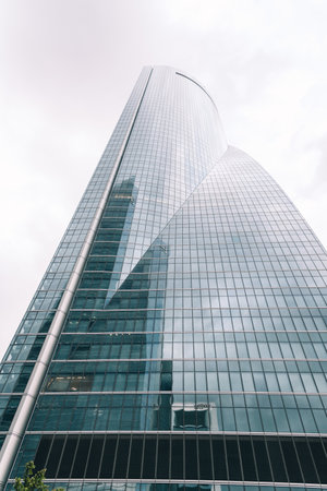 Madrid, Spain - June 25, 2017: Low angle view of  skyscraper in Cuatro Torres Business Area, CTBA, Four Towers Business Area, a business district in Madrid against skyのeditorial素材