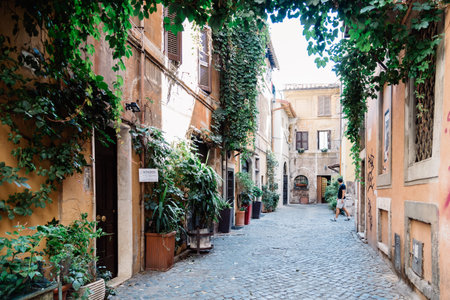 Rome, Italy - August 20, 2016: Picturesque pedestrian street in Trastevere a sunny summer day in Romeのeditorial素材