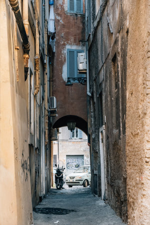 Rome, Italy - August 20, 2016: Picturesque pedestrian alley in historical centre of Rome a sunny summer dayのeditorial素材