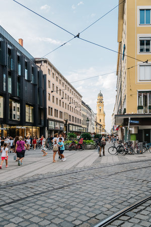 Scenic view of commercial street with luxury stores and a crowdのeditorial素材