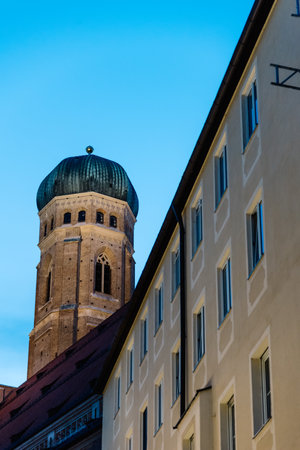 Outdoors view of the tower of the cathedral of Munich at sunset.のeditorial素材