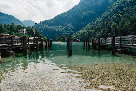Pier in Konigssee lake a sunny summer dayの写真素材