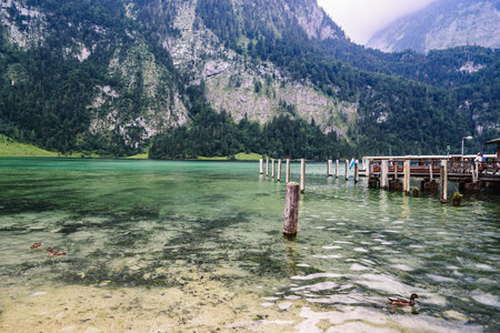 Pier in Konigssee lake a sunny summer dayのeditorial素材