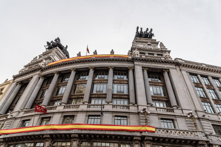 Low angle view of Spanish classic office building in Madridのeditorial素材