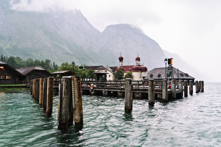 Pier in Konigssee lake a rainy summer dayのeditorial素材