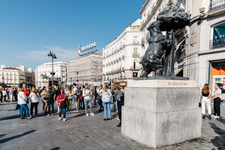 Madrid, Spain - October 15, 2017: Statue of the Bear and the Strawberry Tree in Puerta del Sol, Gate of the Sun. Square in Madrid. It is the heraldic symbol of Madrid.のeditorial素材