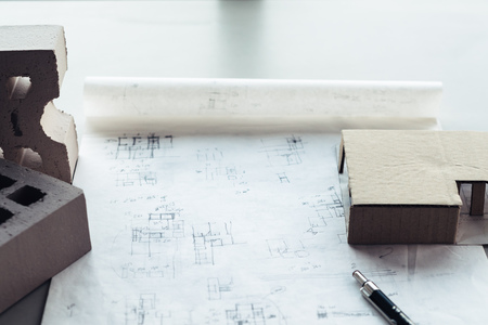 Architect desk with drawing sketches