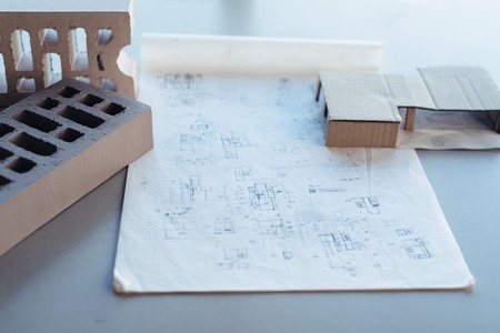 Architect desk with drawing sketches