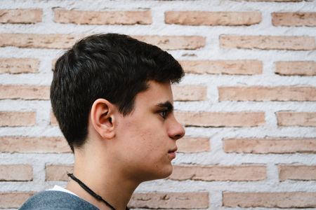 Side head shot of young adult manの写真素材